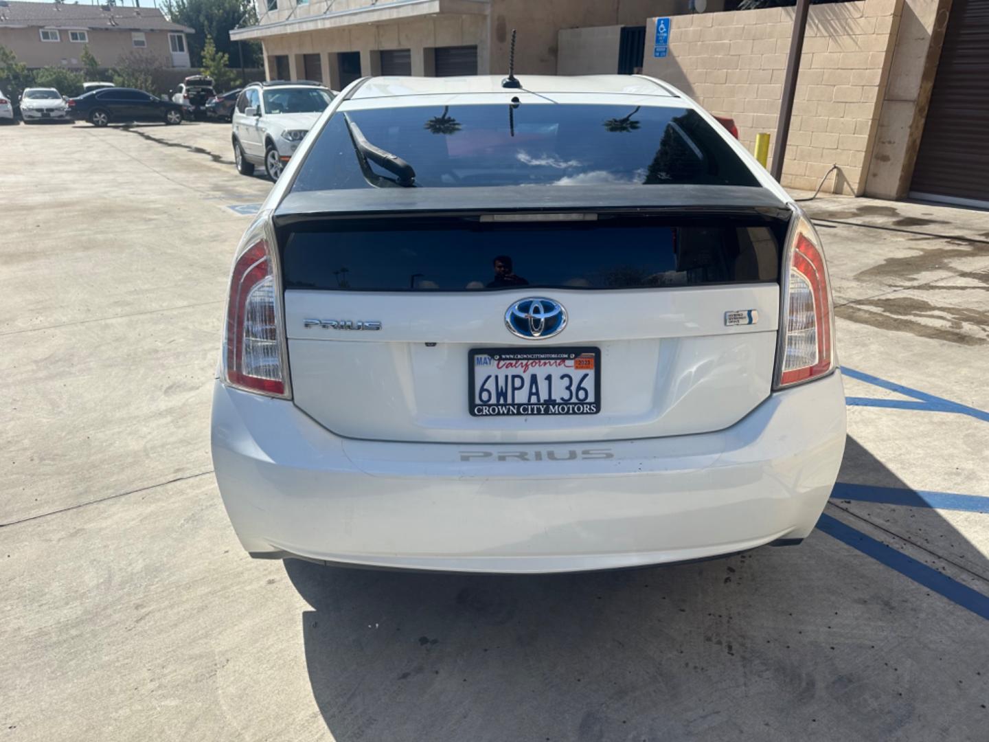 2012 WHITE Toyota Prius Cloth (JTDKN3DU3C1) with an 4 Cylinder engine, AUTOMATIC transmission, located at 30 S. Berkeley Avenue, Pasadena, CA, 91107, (626) 248-7567, 34.145447, -118.109398 - Crown City Motors is a used “Buy Here Pay Here” car dealer in Pasadena CA. “Buy Here Pay Here” financing, means that when you purchase your vehicle from our dealership, that you make the payments to the dealership as well. We do not need the banks approval to get you approved for a used auto - Photo#3